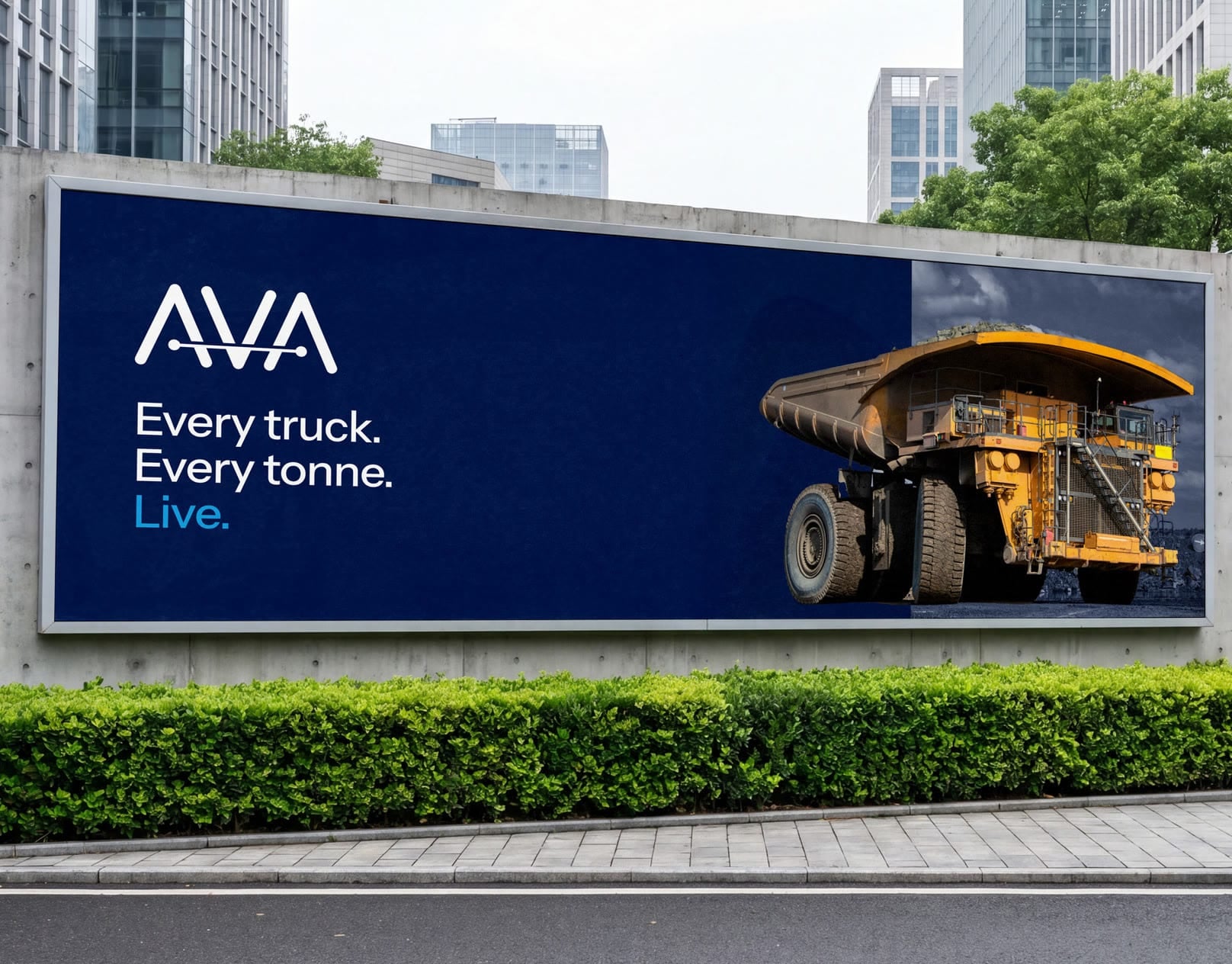 AVA billboard with a haul truck split into its digital twin