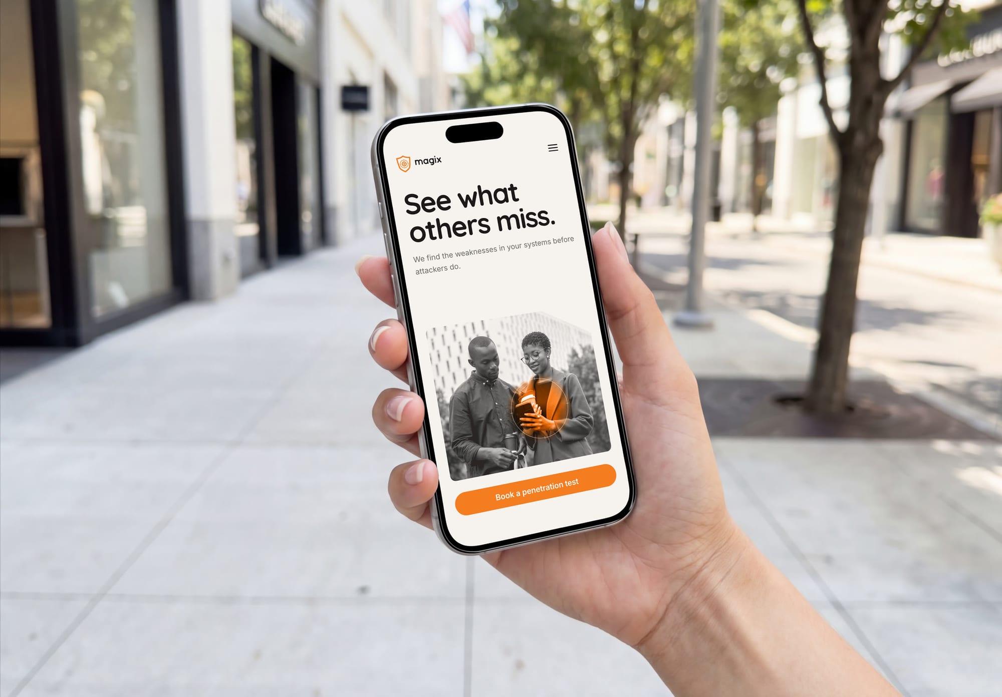 The Magix mobile site on a phone in the street