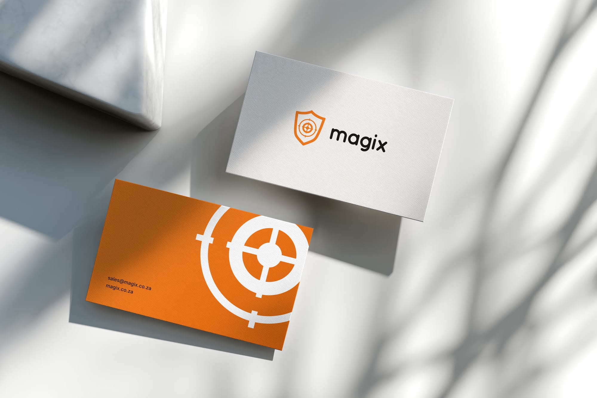 Paper and orange business cards